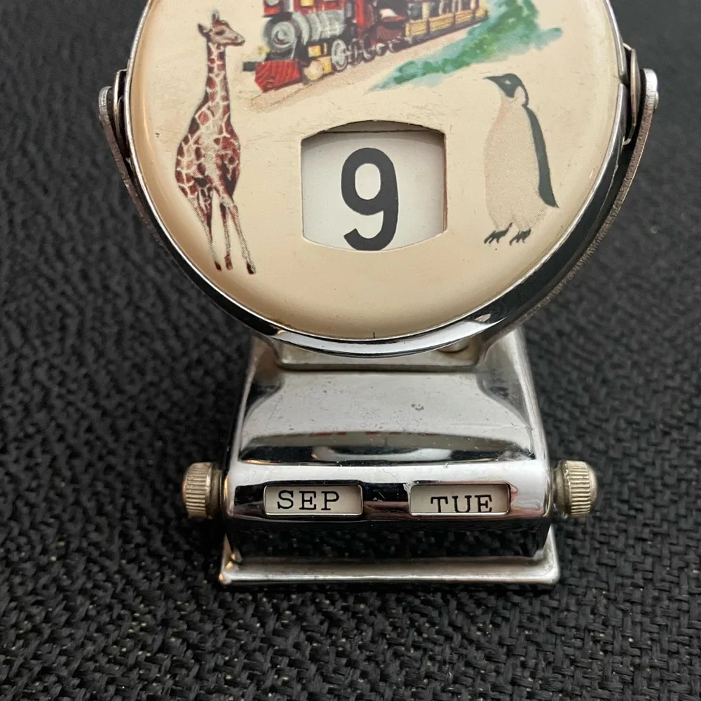 VTG metal perpetual flip calendar featuring Portland Zoo graphic